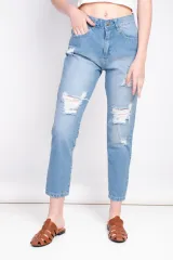 JEAN MOM CON ROTURAS
